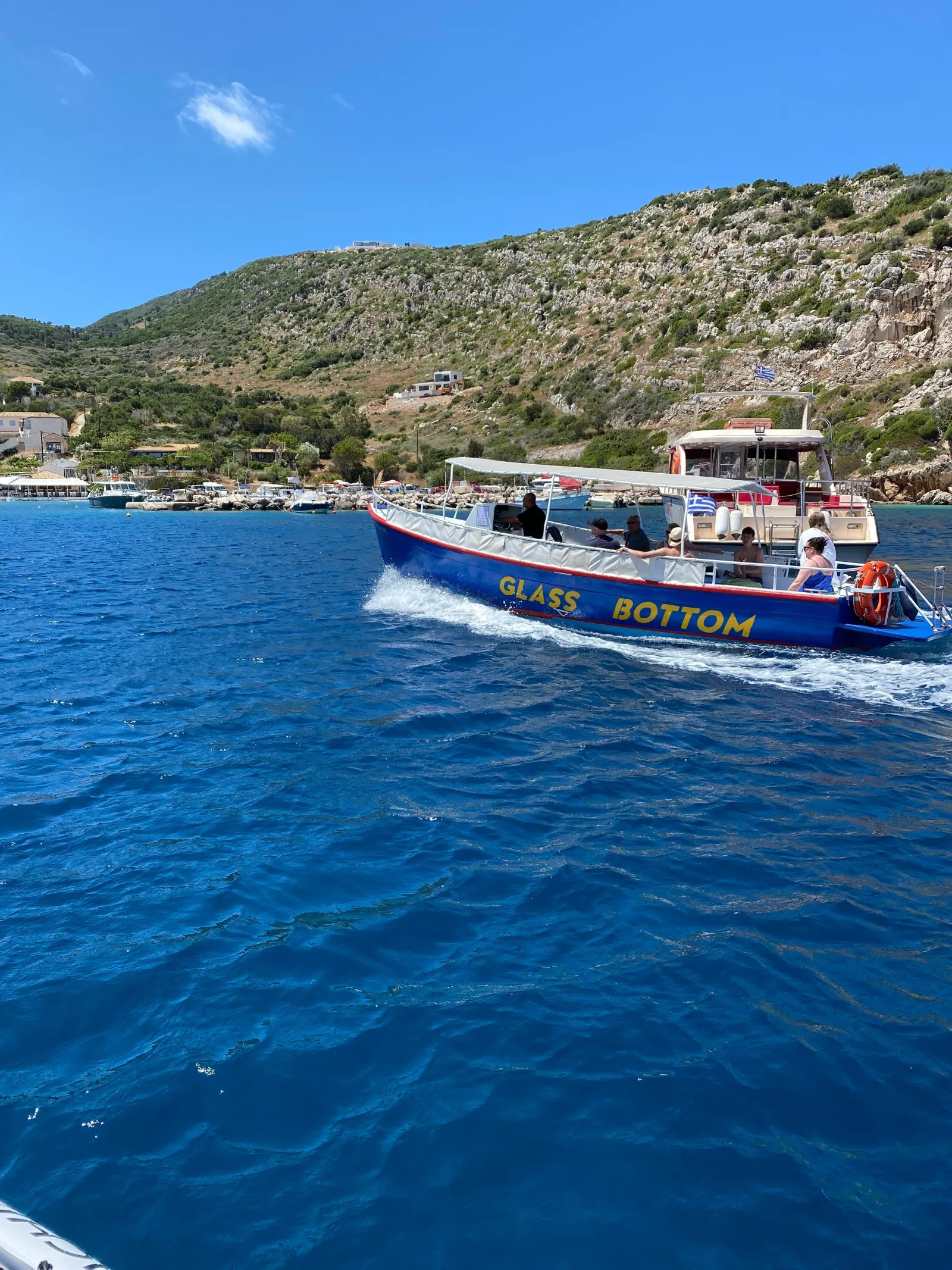 The glass-bottom boat leaving Agios Nikolaos harbour