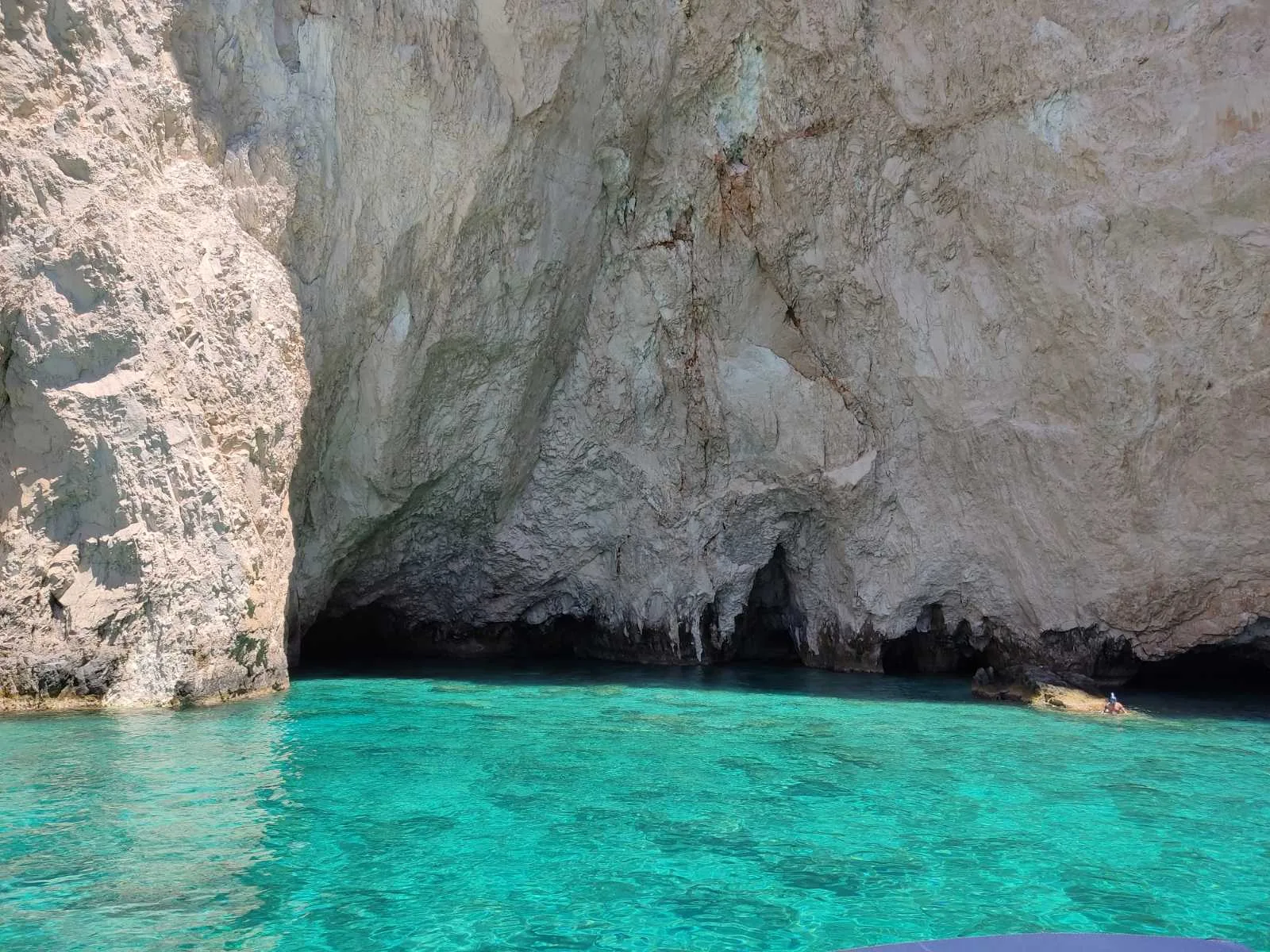 A sea cave in the cliffs of Cape Keri seen from the water