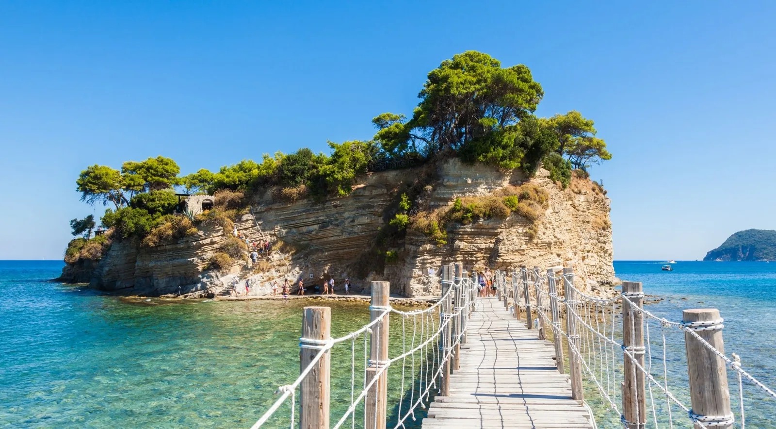 The wooden footbridge to Cameo Island at Agios Sostis, where many turtle boats depart